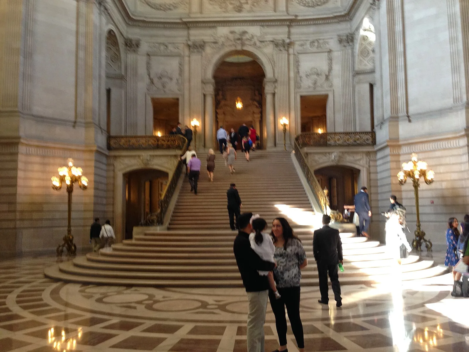 The grand marble staircase inside the San Francisco City Hall rotunda